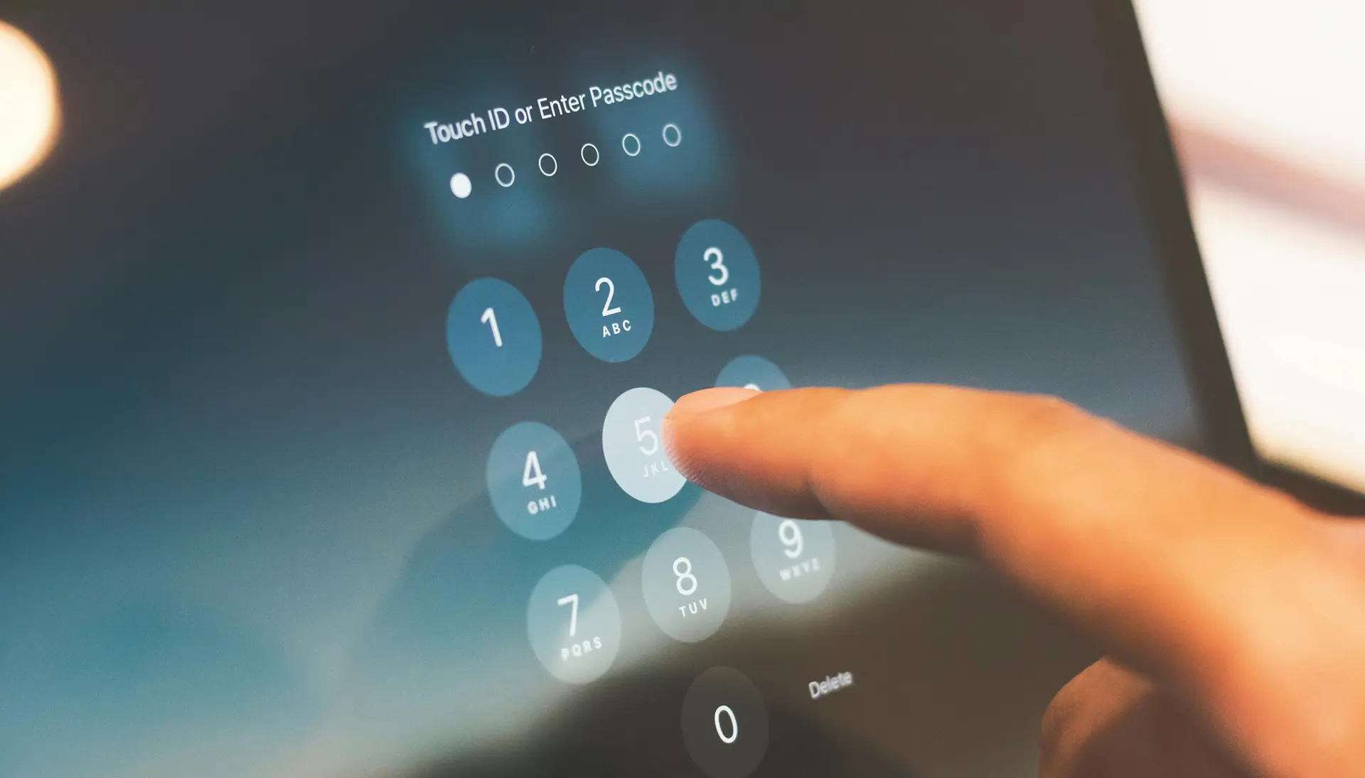 A persons finger is touching a tablet screen